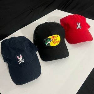 New bass pro shop cap, 2 used psycho bunny caps. Selling together